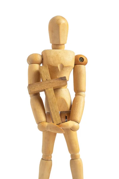 Wood Puppet Man Holding Simple Wood Cross. Adjustable Wood Doll Mannequin on iSolated White Background.