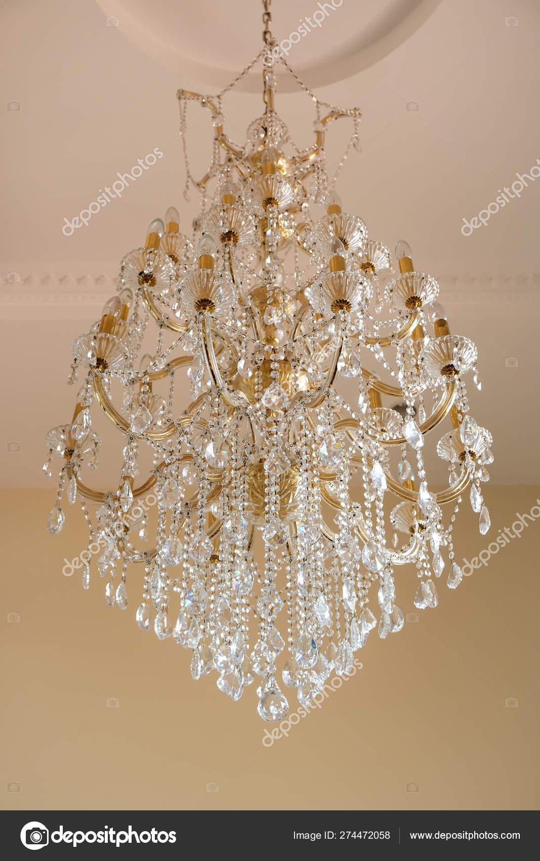 Luxurious Crystal Chandelier Lamp On The Ceiling Stock Photo