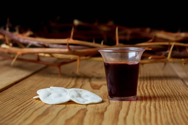 Holy Communion, a Cup of Wine and Bread with a Jesus Crown Thorn.