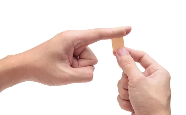 Degetul masculin cu tencuială adezivă. Închideți tencuiala medicală — Fotografie, imagine de stoc