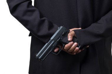 Elinde tabanca olan bir işadamı. Assassin Konsept Resmi