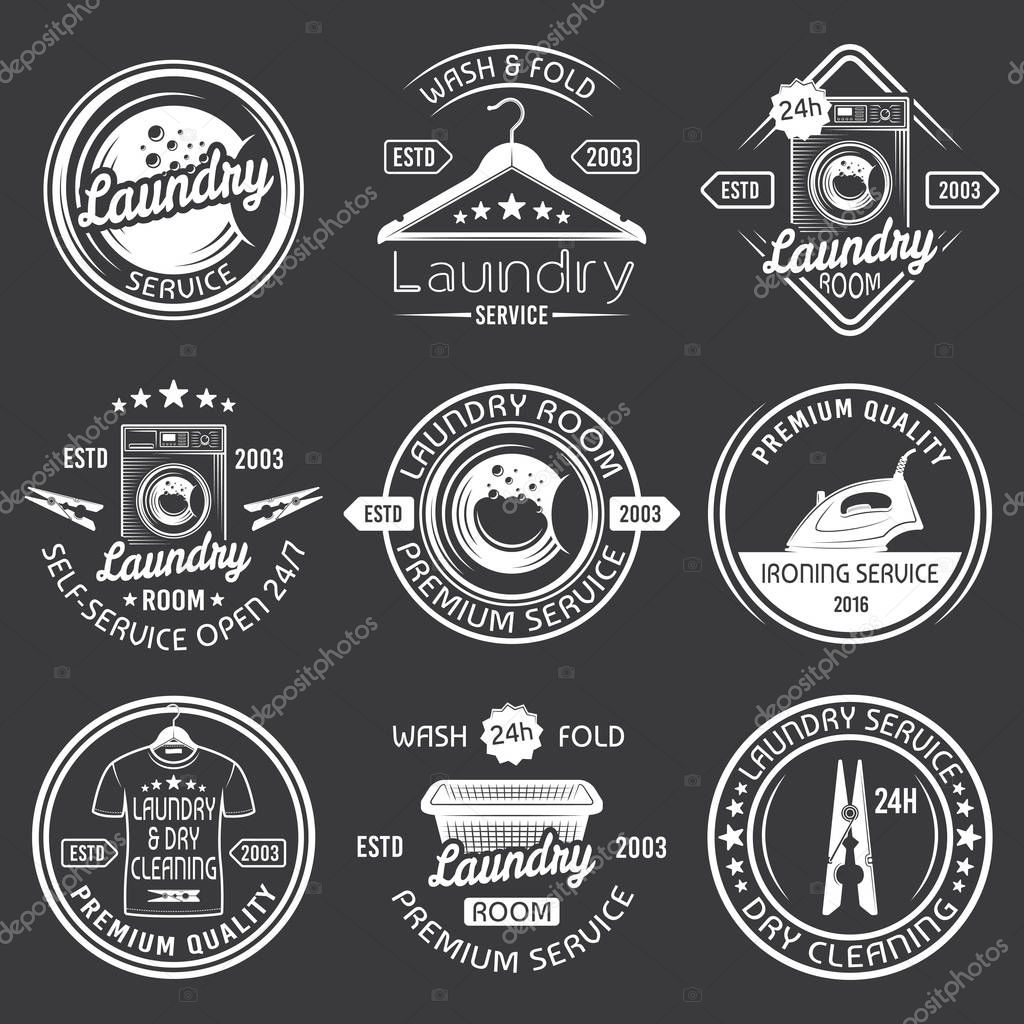 Laundry room and dry cleaning service set of vector white emblems, labels and badges with washing machine, hanger, clothes basket, clothespin, isolated on dark background