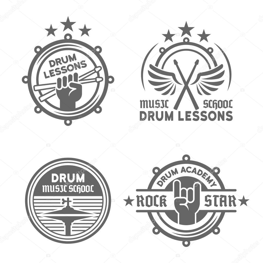 Drum school or drum lessons set of four vector vintage monochrome labels, badges, emblems isolated on white background