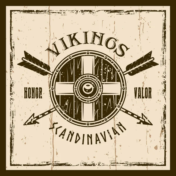 バイキングの盾との交差矢印ベクトル紋章 — ストックベクタ