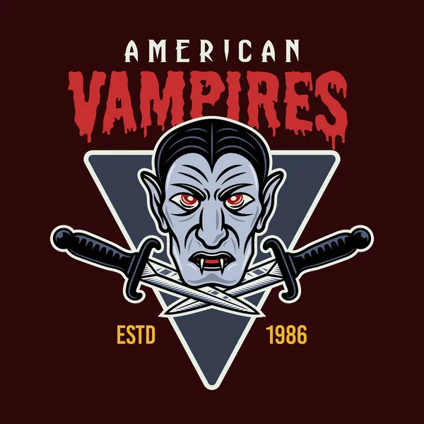 Vampyrhuvud och två dolkar färgade vektor emblem — Stock vektor