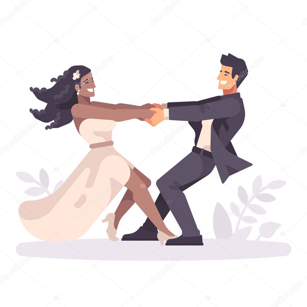 Romantic young wedding couple holding hands and spinning around, forming a heart shape