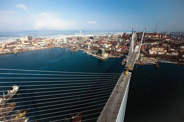 Construction of the bridge birches in Golden Horn Bay in 2012 to the APEC SUMMIT. The Golden Bridge in Vladivostok