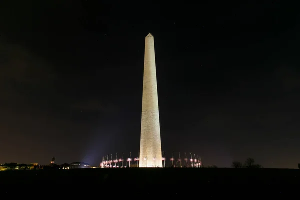 Monumento Washington Por Noche Con Banderas Estadounidenses Parpadeando — Foto de Stock