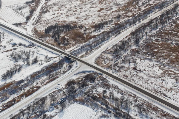 Blick von oben. Landwirtschaftliche Felder im Winter — Stockfoto