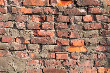 Arka plan texturered tuğla duvar. Yazıtlar veya reklamları için duvara yakın koydu.