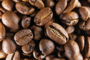 Kavrulmuş kahve çekirdekleri, arka plan olarak kullanılabilir. Kahve çekirdekleri doku makro.