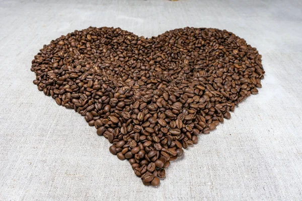 Roasted coffee beans, can be used as a background. Coffee beans texture.