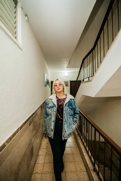 Stylish Blonde Woman Walking Minimalistic Hallway — Stock Photo, Image