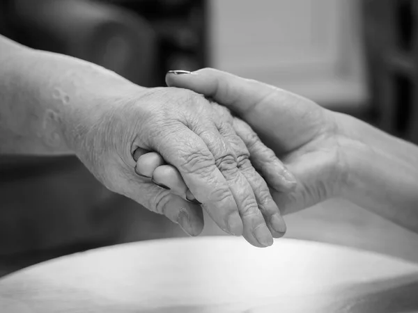 Hand Handyoung Woman Holding Elderly Woman Hand — Stock Photo, Image