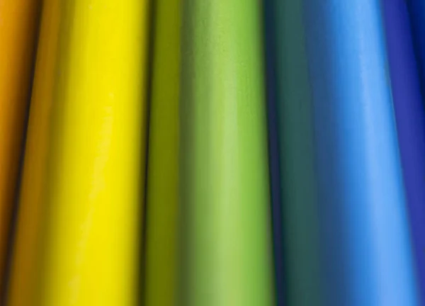Abstrakta rainbow collage av trä färgpennor — Stockfoto