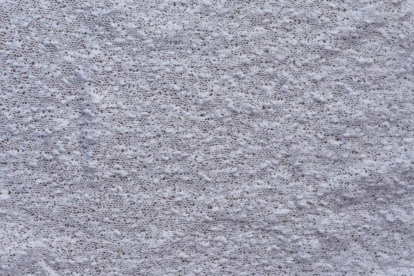 Texturierte Hintergrund aus weißem Strick Draufsicht Nahaufnahme — Stockfoto