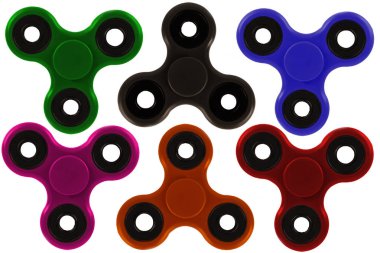 Renkli topluca spinner, oyuncak, beyaz arka plan üzerinde izole giderici bir stres topluluğu. Doğrudan yukarıdaki.