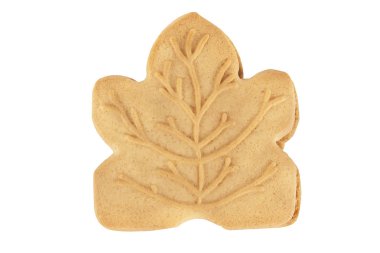 Beyaz arka planda izole akçaağaç krem ile dolu gurme çerez, doğrudan yukarıda. Kesme.