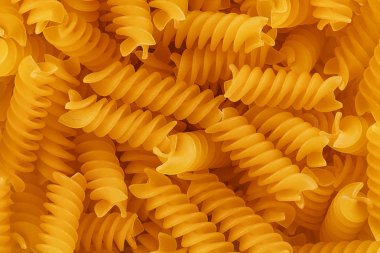 Pişmemiş fusilli makarna arka plan dokusu üst görünümü. Metniniz için alan kopyalama.