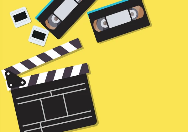 Film klepel en video cassettebandjes op gele achtergrond — Stockvector