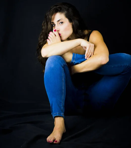 Beautiful Woman Kissing Her Foot Black Background — Stock Photo, Image