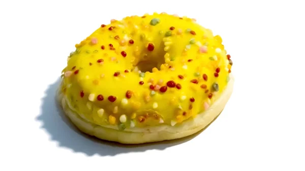 Γλυκό νόστιμο ντόνατ με πολύχρωμα ψεκάζει απομονώνονται σε λευκό πίσω — Φωτογραφία Αρχείου