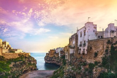 Polignano a Mare village on the rocks at sunrise, Bari, Apulia, South Italy. Avrupa.