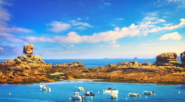 Tregastel, boat in fishing port and the dice or le de rock in pink granite coast and atlantic ocean. Armor coast les rochers, Brittany, France. Europe. clipart