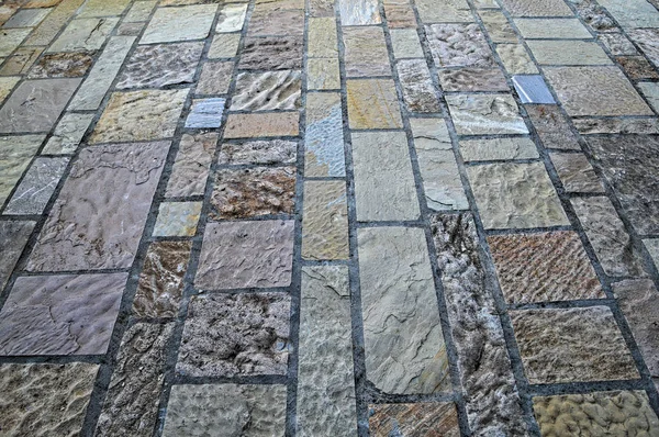 Decorated bricks tiles sidewalk, close up — Stock Photo, Image