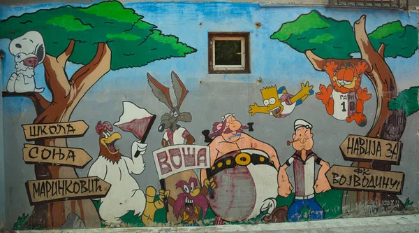 NOVI SAD, SERBIA - August 21st - graffiti on wall in school with various cartoon characters — Stock Photo, Image