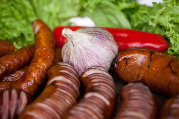 Grilled Fruit and Vegetable. Delicious grilled sausages. Fine Food Fair.