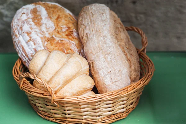 Bread in a basket in the baking shop. Bread Basket In A Window