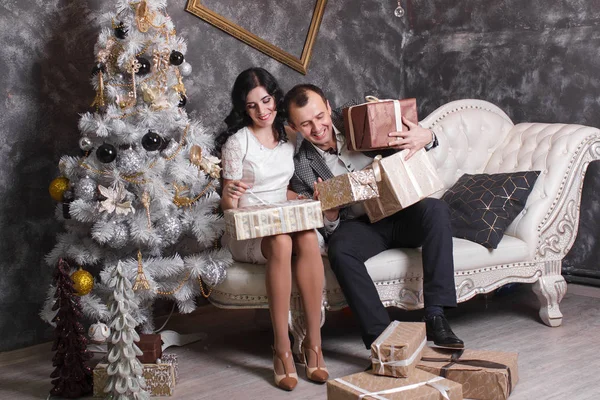 Happy Couple Lovers Give Each Other Gifts Sitting Bed Christmas — Stock Photo, Image