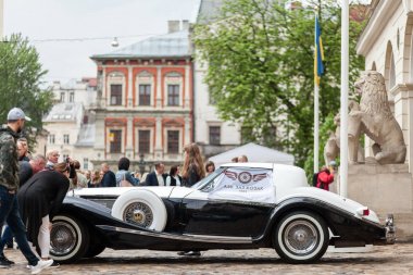 Lviv, Ukraine - May 3, 2019: LVIV CITY DAY Luxury retro car Phillips Berlina coupe. clipart