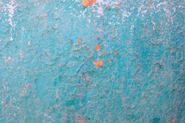 ahşap bir yüzey üzerinde mavi boya kırık