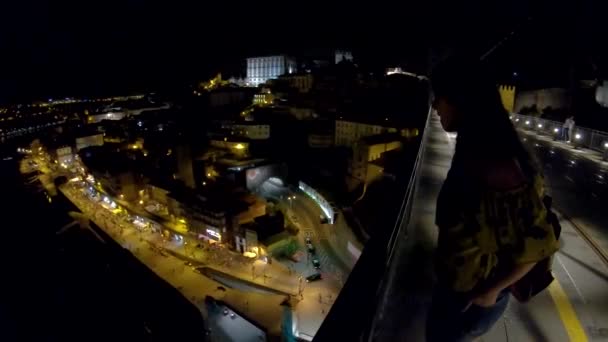 GIRL WATCHING PORTO BAY from LUIS I BRIDGE, PORTO, PORTUGAL — Vídeo de Stock