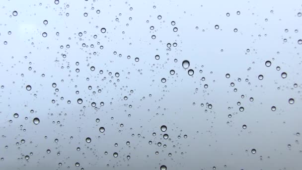 AGUA DROPS EN LA VENTANA Mientras llueve fuerte — Vídeo de stock