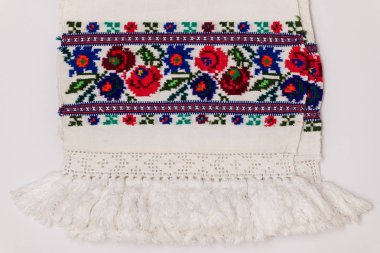 Closeup of Eastern European embroidery design with floral motifs found on towels and clothing. clipart