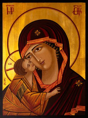 Icon painted in the byzantine or orthodox style depicting Virgin Mary and Jesus. clipart