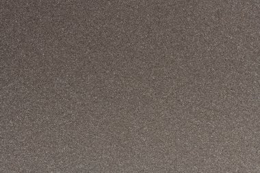 Sentetik liflerden yapılmış gri ambalaj malzemesi..