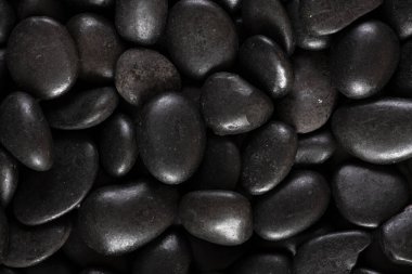 Black river stones texture and background. clipart