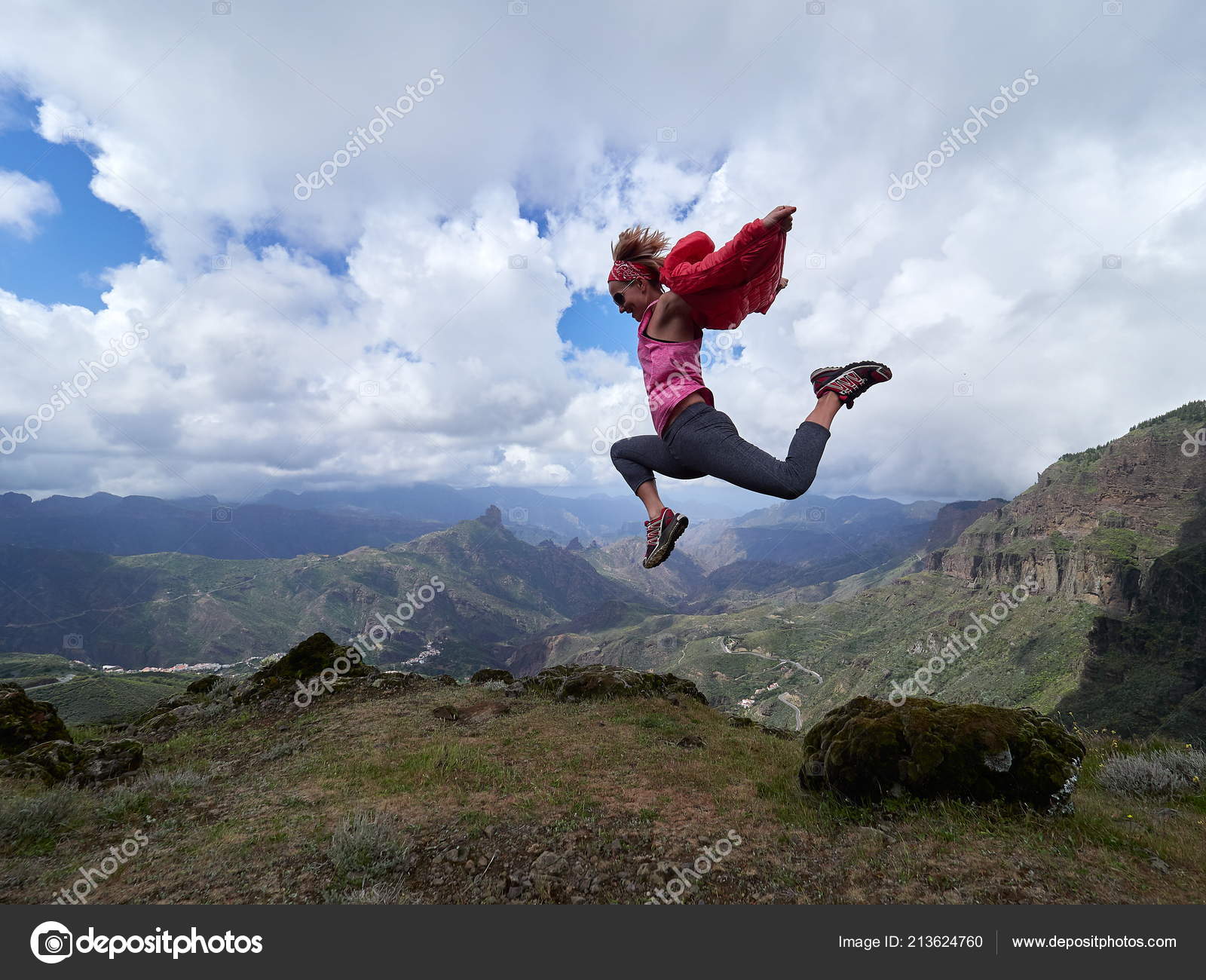 Woman jumping on top of a man, teen with braces