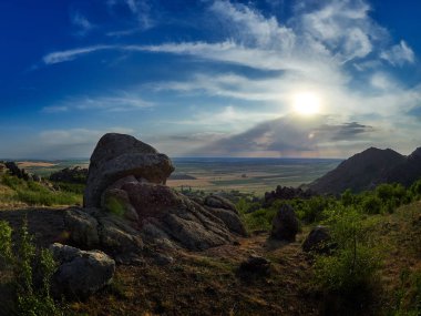 mountain landscape with beautiful sky in Dobrogea, Romania - aeria lview