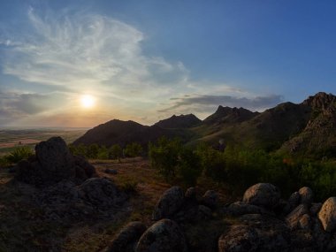 mountain landscape with beautiful sky in Dobrogea, Romania - aeria lview