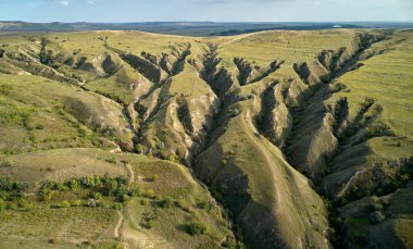 aerial view of interesting earth formations in Dobrogea, Romania clipart