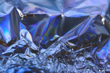 Sanal yanardöner folyo dokusu arka planı. Posterler, kartlar, el ilanları, broşürler, dergiler ve her türlü kapak için kullanılabilir.