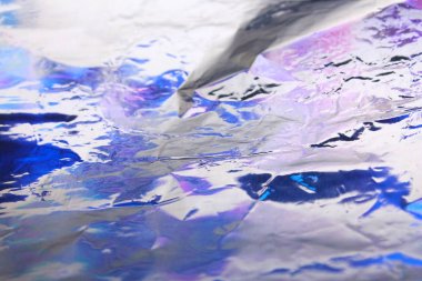 Sanal yanardöner folyo dokusu arka planı. Posterler, kartlar, el ilanları, broşürler, dergiler ve her türlü kapak için kullanılabilir.