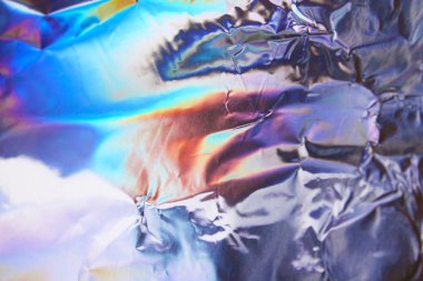 Sanal yanardöner folyo dokusu arka planı. Posterler, kartlar, el ilanları, broşürler, dergiler ve her türlü kapak için kullanılabilir.