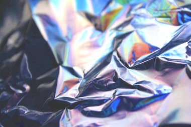 Sanal yanardöner folyo dokusu arka planı. Posterler, kartlar, el ilanları, broşürler, dergiler ve her türlü kapak için kullanılabilir.