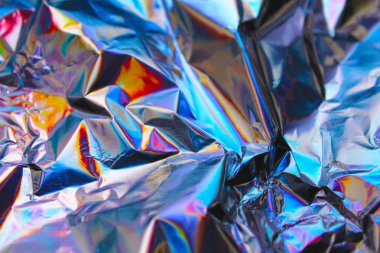 Sanal yanardöner folyo dokusu arka planı. Posterler, kartlar, el ilanları, broşürler, dergiler ve her türlü kapak için kullanılabilir.